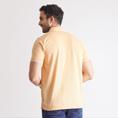 Camiseta tipo polo regular fit color naranja