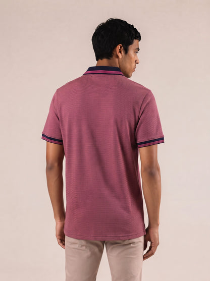 Camiseta tipo polo regular fit color rosa claro